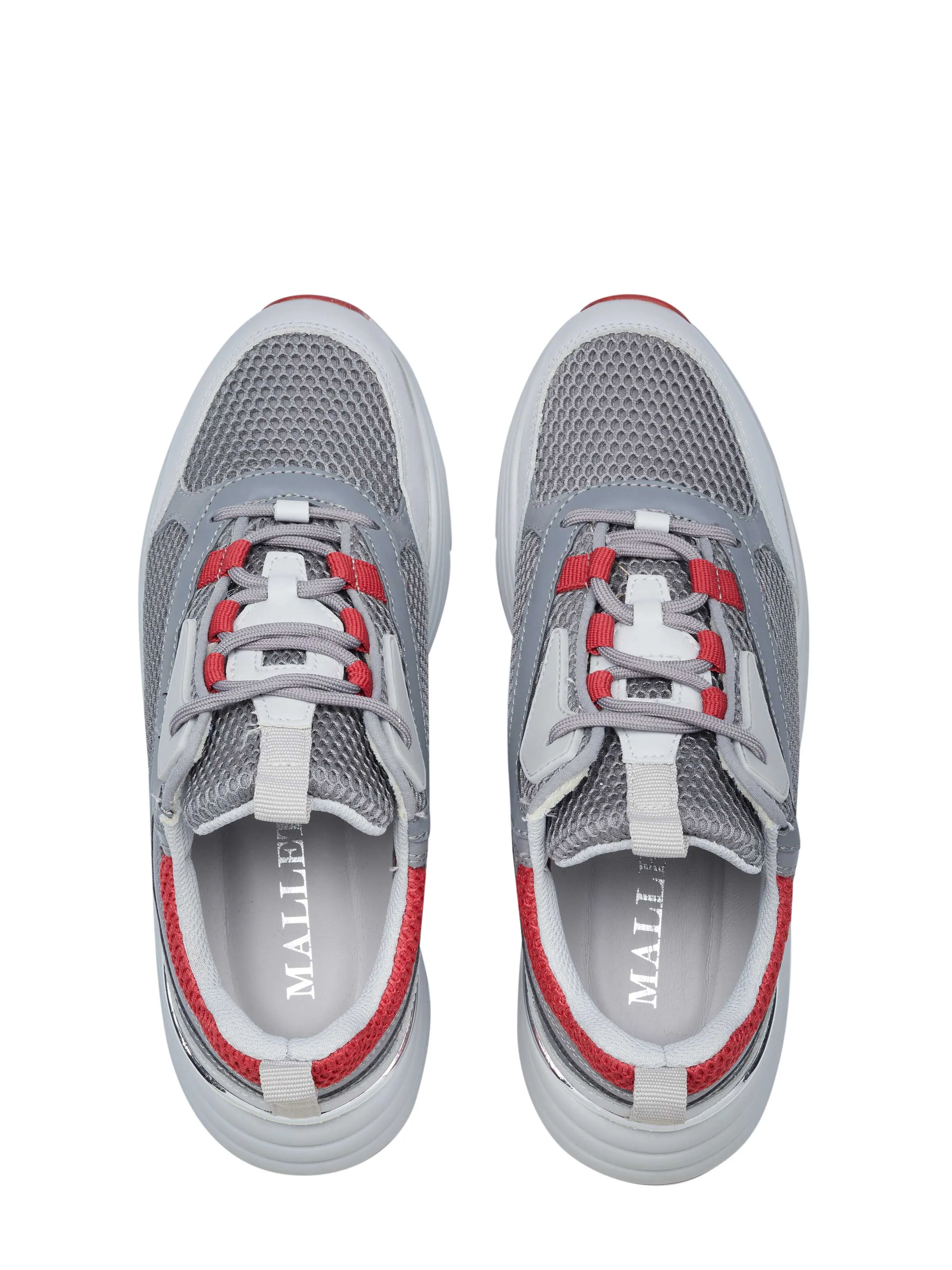 Grey and red mallet shoes.