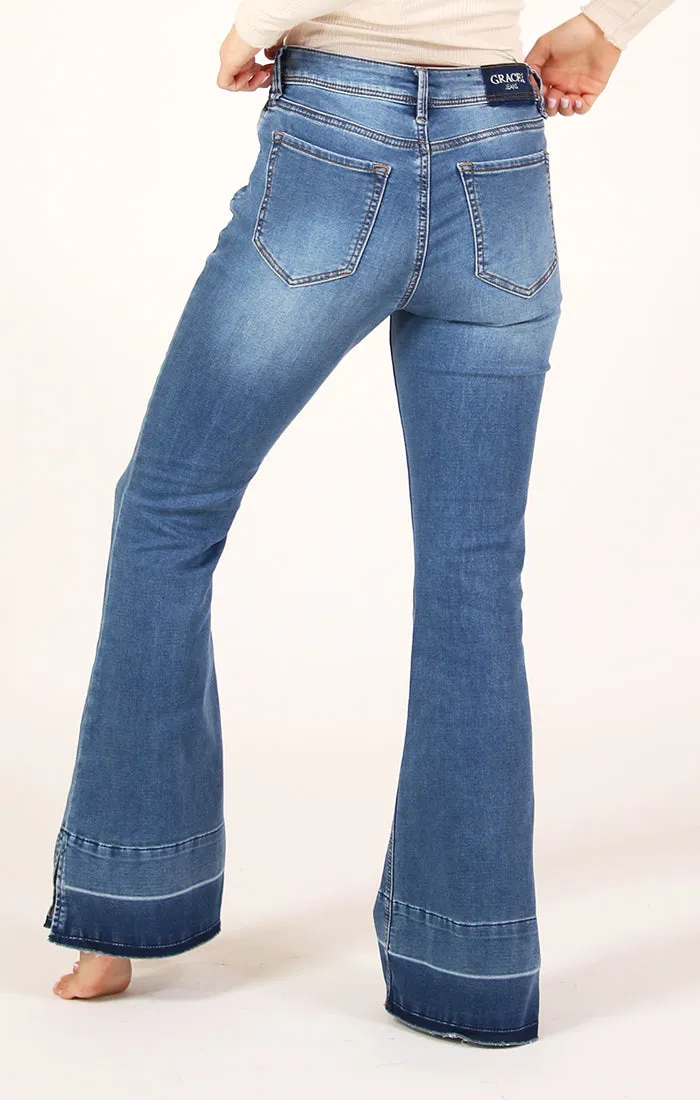 Mid Rise Flare Jeans in Medium Wash Knit Denim