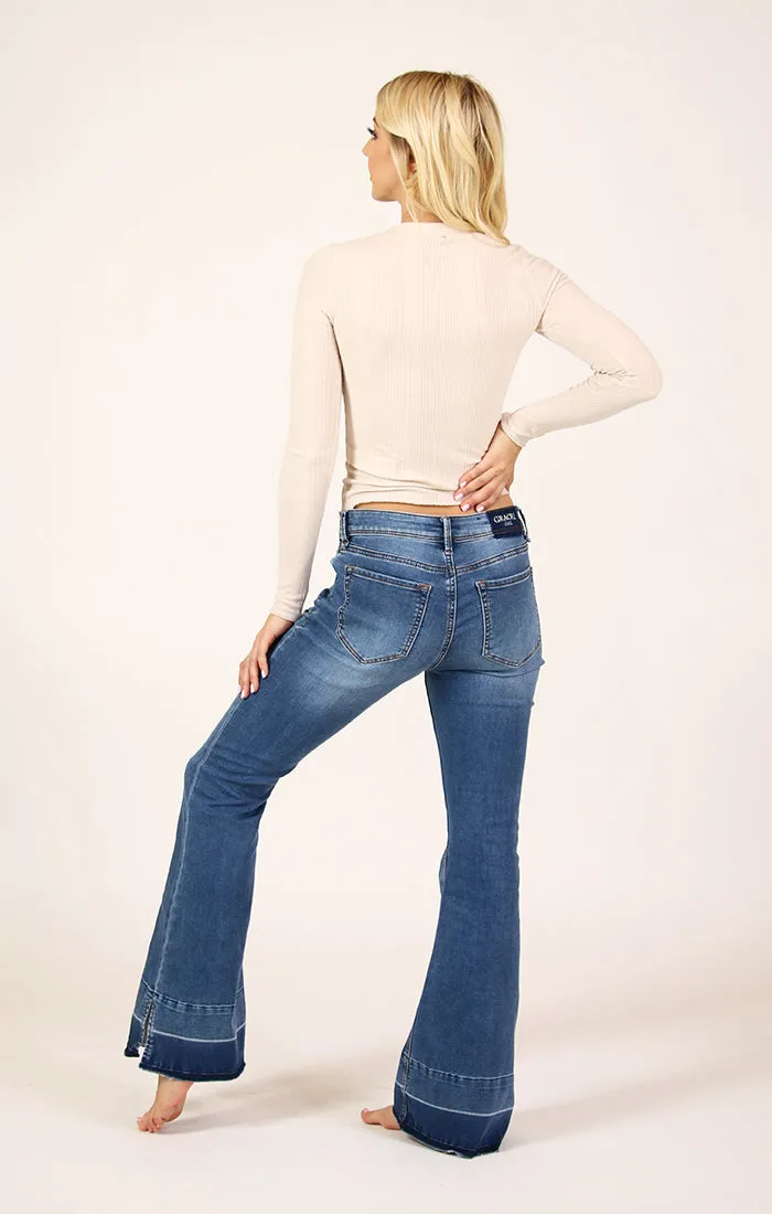 Mid Rise Flare Jeans in Medium Wash Knit Denim