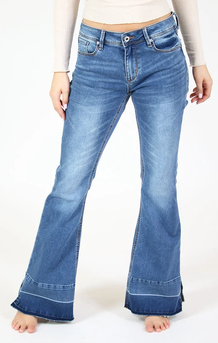 Mid Rise Flare Jeans in Medium Wash Knit Denim