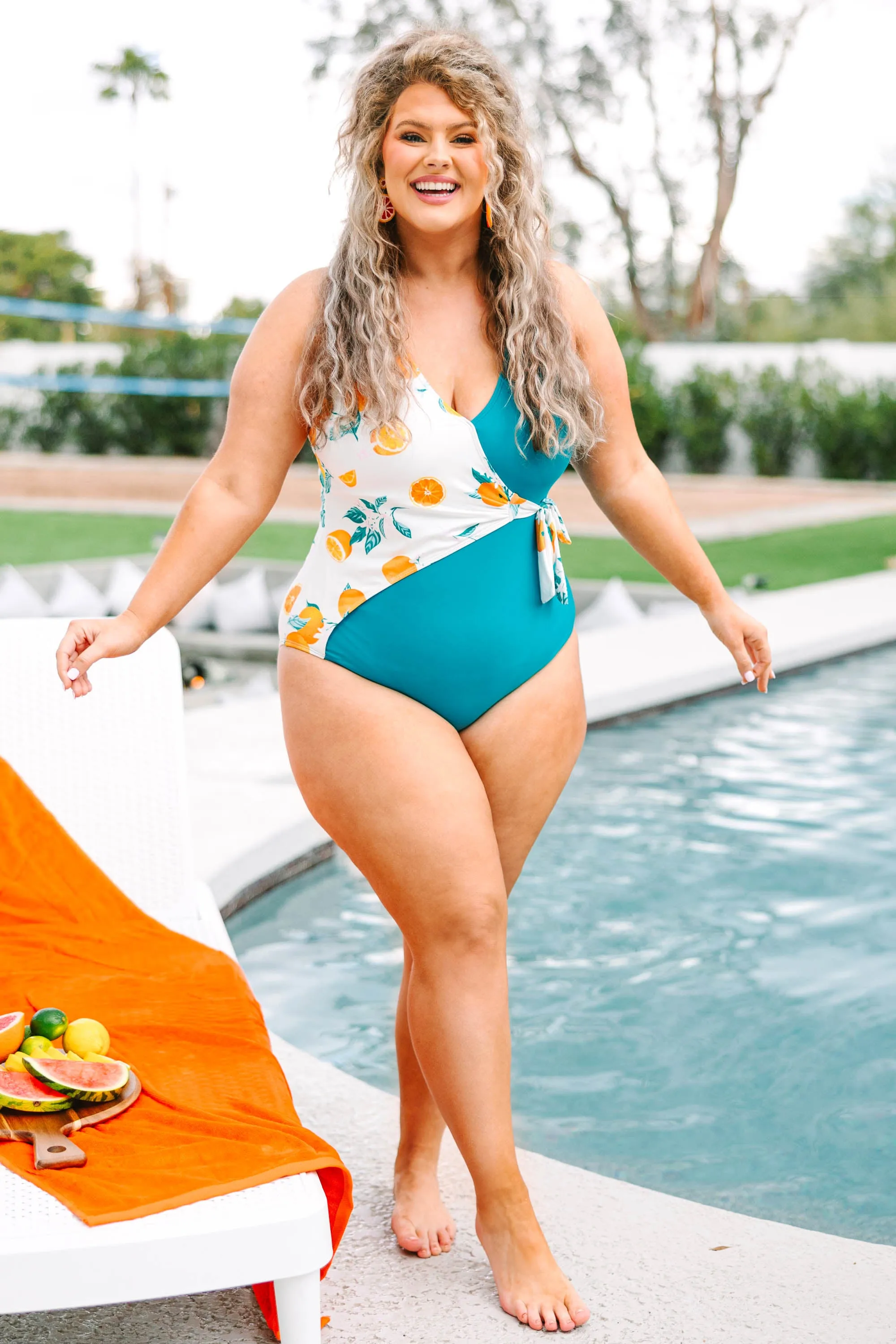 Swimsuit in Teal Color with Sunny Design.